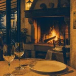 Restaurant la caleche le beausset : salle chaleureuse, cheminée et véranda
